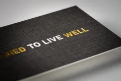 A linen-textured card with a subtle crosshatch grain.
