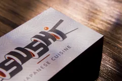 An uncoated natural card stock with a raw matte feel.